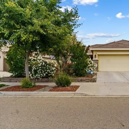 Buy this 4 bed house on 3602 West Perez Avenue in Visalia, CA 93291