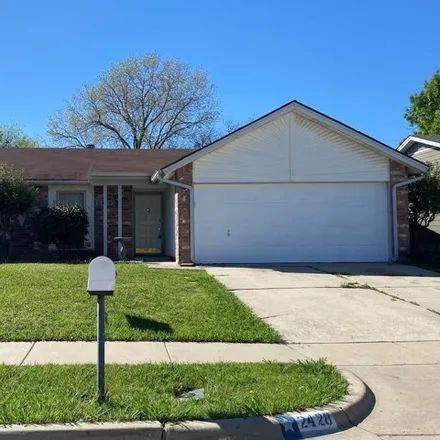 Rent this 3 bed house on 2407 Heathercrest Drive in Arlington, TX 76018