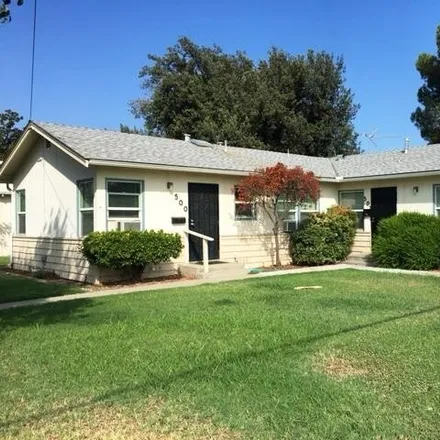 Rent this 2 bed house on 402 Central Avenue in Hanford, CA 93230