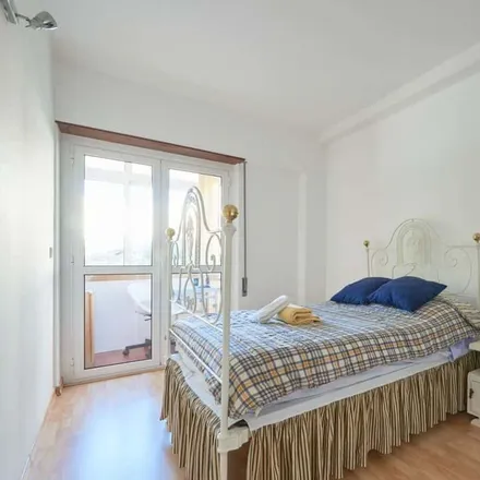 Rent this 3 bed room on Rua Luciano Freire in 1600-093 Lisbon, Portugal