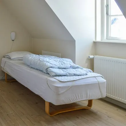 Rent this 3 bed duplex on 9990 Skagen