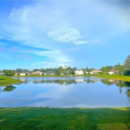 Buy this 4 bed house on 17500 Sterling Lake Drive in Timberwalk at Three Oaks, Lee County