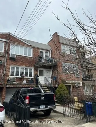 Buy this 7 bed house on 122 28th Avenue in New York, NY 11214