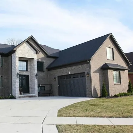 Buy this 4 bed house on 19011 Riverpark Boulevard in Macomb Township, MI 48044