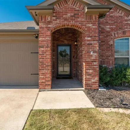 Rent this 4 bed house on 2345 Carrier Drive in Fate, TX 75189