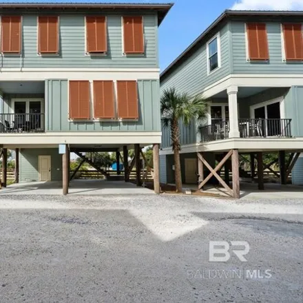 Buy this 2 bed house on Hammock Dunes West in 23916 Perdido Beach Boulevard, Orange Beach
