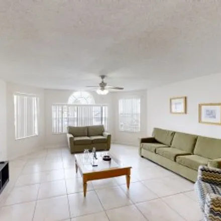 Buy this 3 bed apartment on #115,2731 North Poinciana Boulevard