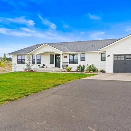 Buy this 4 bed house on 813 North Mize Road in Yakima County, WA 98908