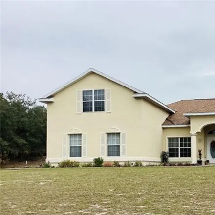Buy this 5 bed house on 2999 Southwest Breezy Point Drive in Marion County, FL 34431