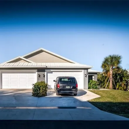 Rent this 2 bed house on 225 Lewis Circle in Fishermens Village, Punta Gorda