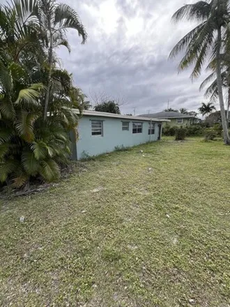 Buy this 3 bed house on 8536 Southeast Mars Street in Hobe Sound, Martin County