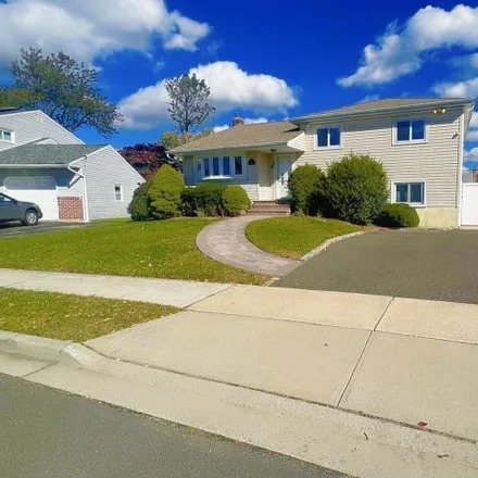 Rent this 4 bed house on 57 Amherst Lane in Hicksville, NY 11801