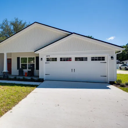 Buy this 4 bed house on 4957 Beige Street in Jacksonville, FL 32258