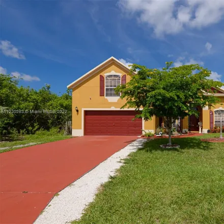 Buy this 5 bed house on 116 Southwest Sea Lion Road in Port Saint Lucie, FL 34953