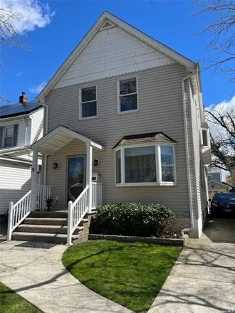 Buy this 4 bed house on 89-09 249th Street in New York, NY 11426