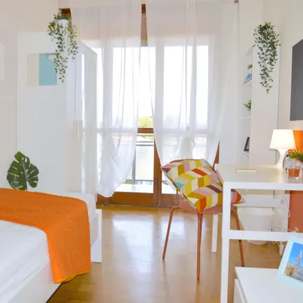 Rent this 6 bed room on Via Lodovico Antonio Vincenzi in 19, 41124 Modena MO
