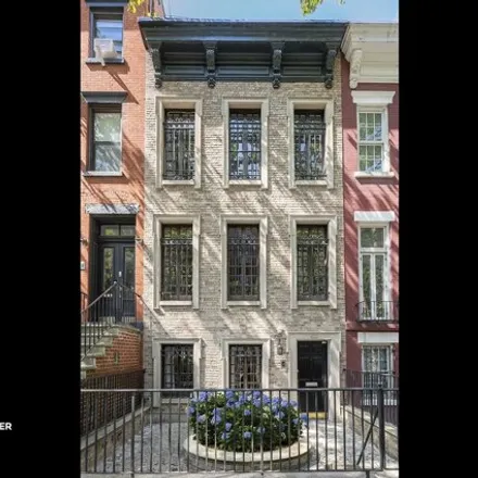 Buy this 4 bed townhouse on 422 East 84th Street in New York, NY 10028