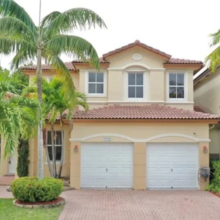 Rent this 4 bed townhouse on 7670 Northwest 113th Path in Doral, FL 33178
