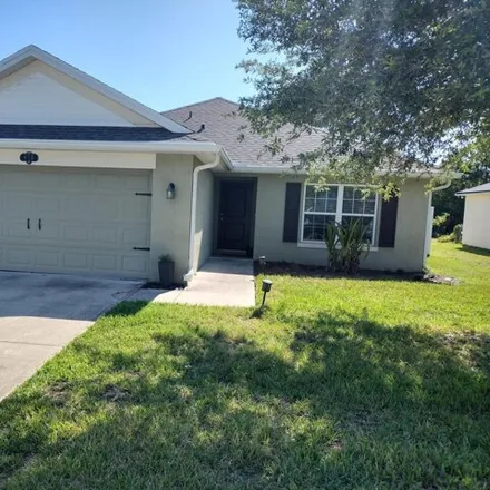 Rent this 3 bed house on 422 Macon Circle in Titusville, FL 32780