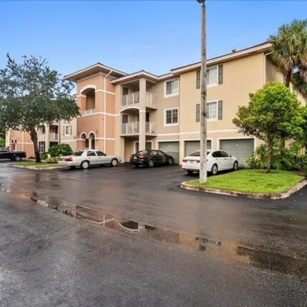 Buy this 3 bed condo on 6426 Emerald Dunes Drive in West Palm Beach, FL 33411