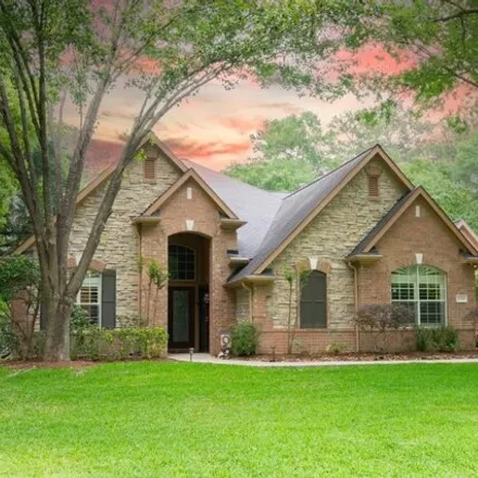 Buy this 4 bed house on 13245 Chappel Wood Lane in Conroe, TX 77302