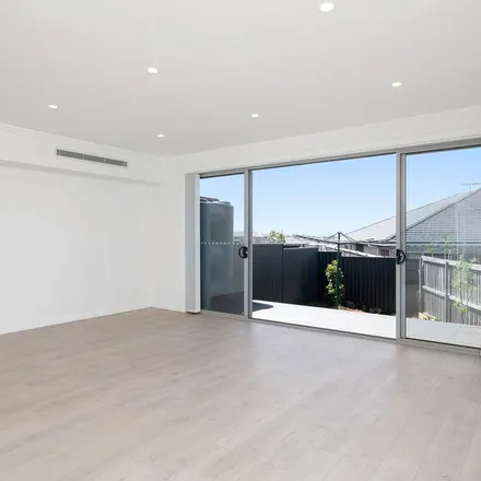 Rent this 4 bed apartment on 31 Warin Avenue in Pemulwuy NSW 2145, Australia