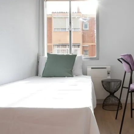 Rent this 3 bed room on Avenida de Miguel Hernández in 28018 Madrid, Spain