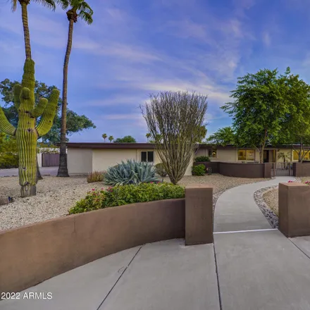 Buy this 4 bed house on 6701 East Desert Cove Avenue in Scottsdale, AZ 85254