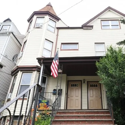 Buy this 6 bed townhouse on 448 Summer Avenue in Newark, NJ 07104