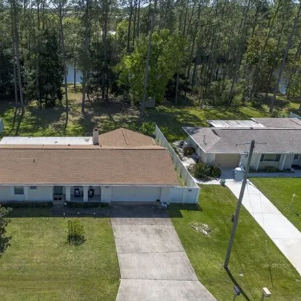 Buy this 3 bed house on 132 Beechwood Lane in Palm Coast, FL 32137