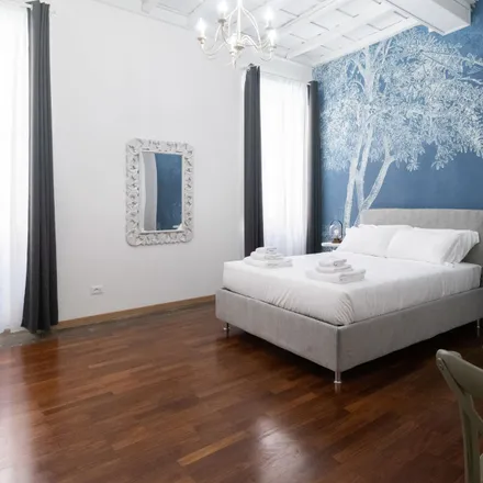 Rent this studio room on Via Vittorio Veneto in 18, 00187 Rome RM