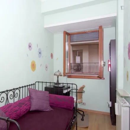 Rent this 2 bed room on Via Fratelli Gualandi in 23, 00135 Rome RM