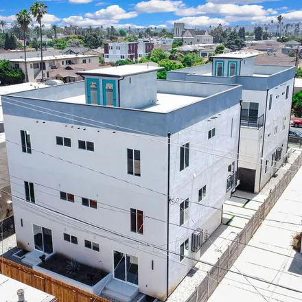 Rent this 4 bed apartment on 4571 Saturn Street in Los Angeles, CA 90019