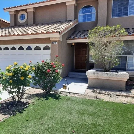 Rent this 4 bed house on 8393 Hollow Wharf Drive in Las Vegas, NV 89128