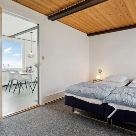 Rent this 3 bed townhouse on Jensen Denmark in Kanegårdsvej, 3700 Rønne