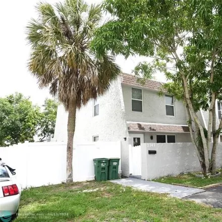 Rent this 4 bed house on 7347 NW 75th St in Tamarac, Florida