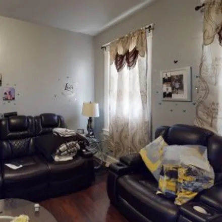 Buy this 3 bed apartment on 2049 Wheeler Avenue in Western Baltimore, Baltimore