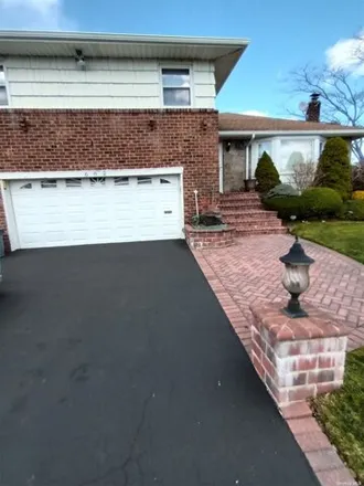 Buy this 4 bed house on 682 Sherman Ct in Westbury, New York