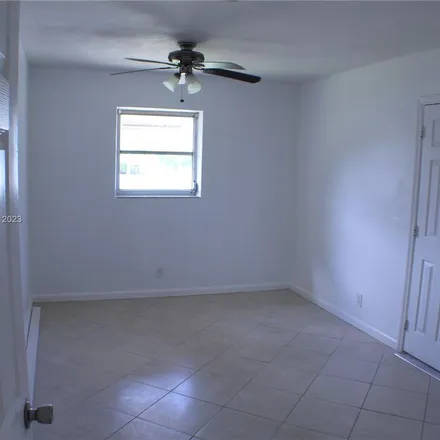 Rent this 3 bed apartment on 4134 Southwest 52nd Street in Playland Isles, Dania Beach