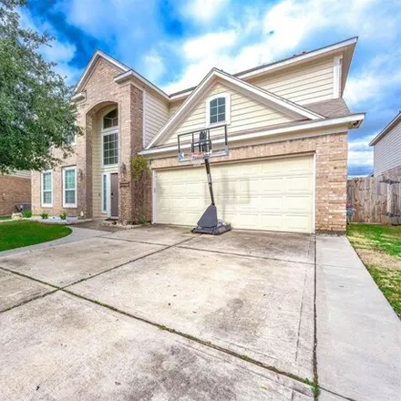 Rent this 4 bed house on 5999 Annatto Drive in Harris County, TX 77521
