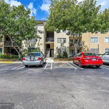 Rent this 2 bed condo on 9150 W Atlantic Blvd Apt 1715 in Coral Springs, Florida
