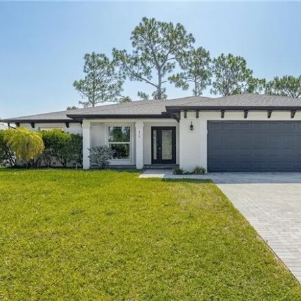 Buy this 3 bed house on 858 Angelo Avenue in Lehigh Acres, FL 33971