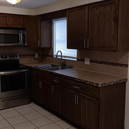 Rent this 2 bed apartment on 3634 Berkshire Street in Elfers, FL 34652