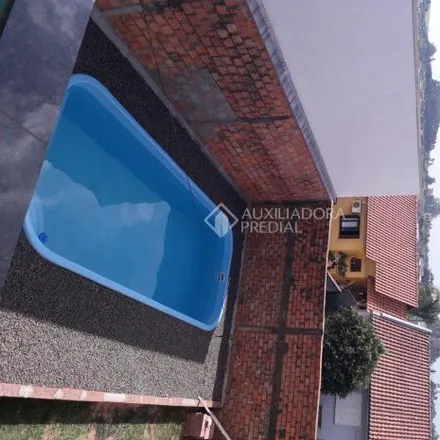 Buy this 3 bed house on Rua Simões Lopes Neto in Jardim dos Lagos, Guaíba - RS