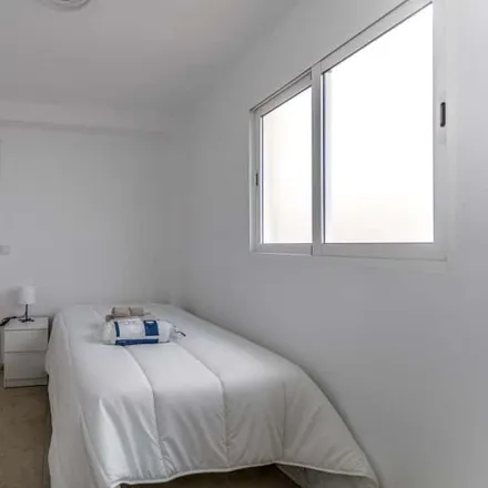 Rent this 4 bed room on Joyería Albors in Carrer del Poeta Mas i Ros, 46022 Valencia