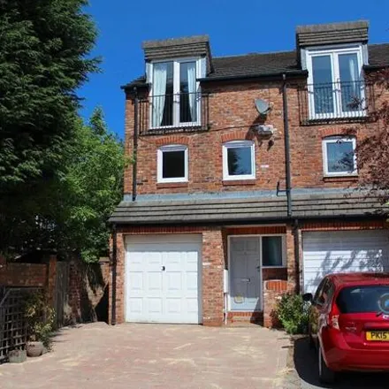 Rent this 3 bed townhouse on 3 Balmoral Way in Wilmslow, SK9 5QW