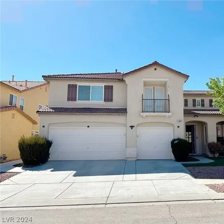 Rent this 4 bed house on 7687 Comanche Canyon Avenue in Enterprise, NV 89113
