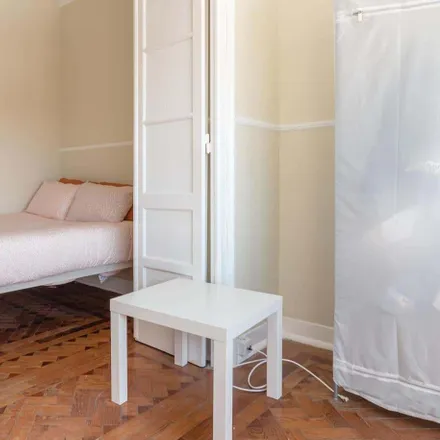 Rent this 7 bed room on Rua Damasceno Monteiro 59 in 1170-108 Lisbon, Portugal