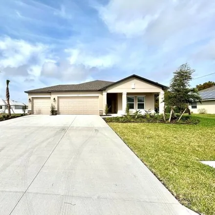 Rent this 4 bed house on 311 31st Avenue in Cape Coral, FL 33991