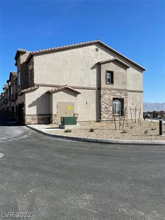 Rent this 3 bed townhouse on 2098 Spring Rose Street in Las Vegas, NV 89134